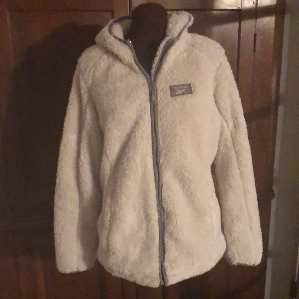 Reebok fuzzy faux fur jacket size LG with gray zipper and piping